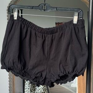 Black Ruffle Hem Shorts
